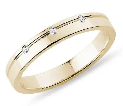 Třídiamantový dámský snubní prsten z lesklého žlutého zlata