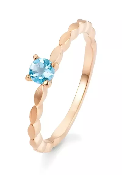 Zlatý zásnubní prsten z růžového zlata s modrým topazem